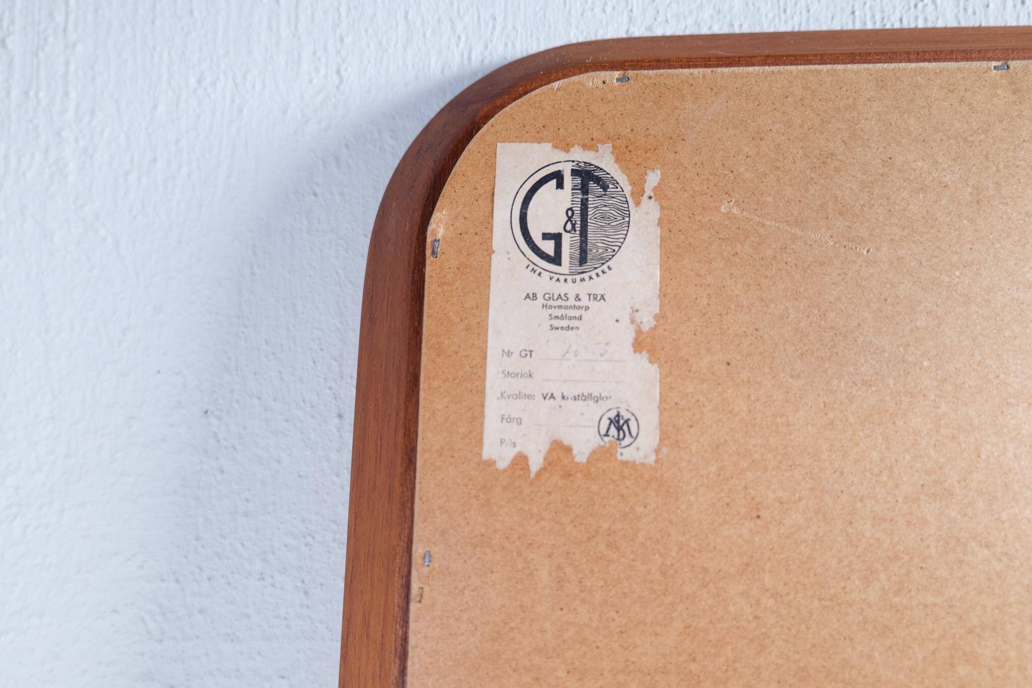 Mid-century modern sculptural wall mirror, teak, crystal glass, Glas & Trä, 1960s