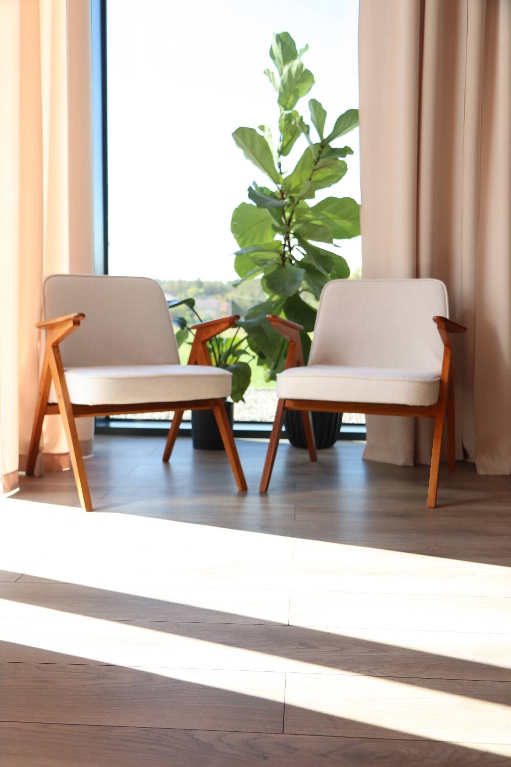 Pair of vintage white bouclé armchairs