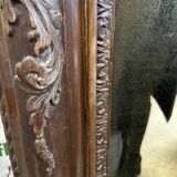 Large carved wooden mirror
