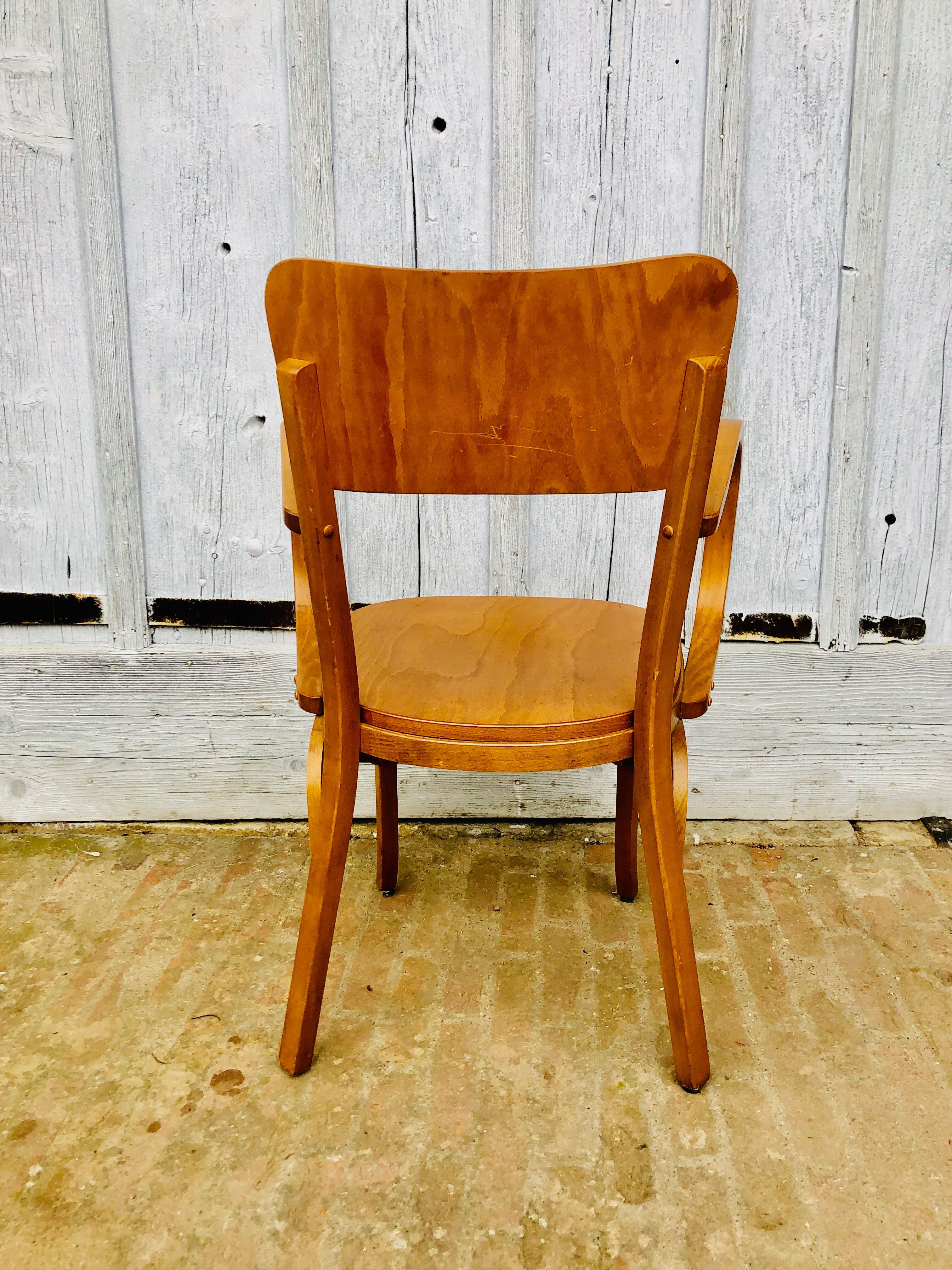 Baumann armchair curved wood armrests
