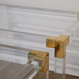 Nesting tables from the 1970s in brass, glass and lucite