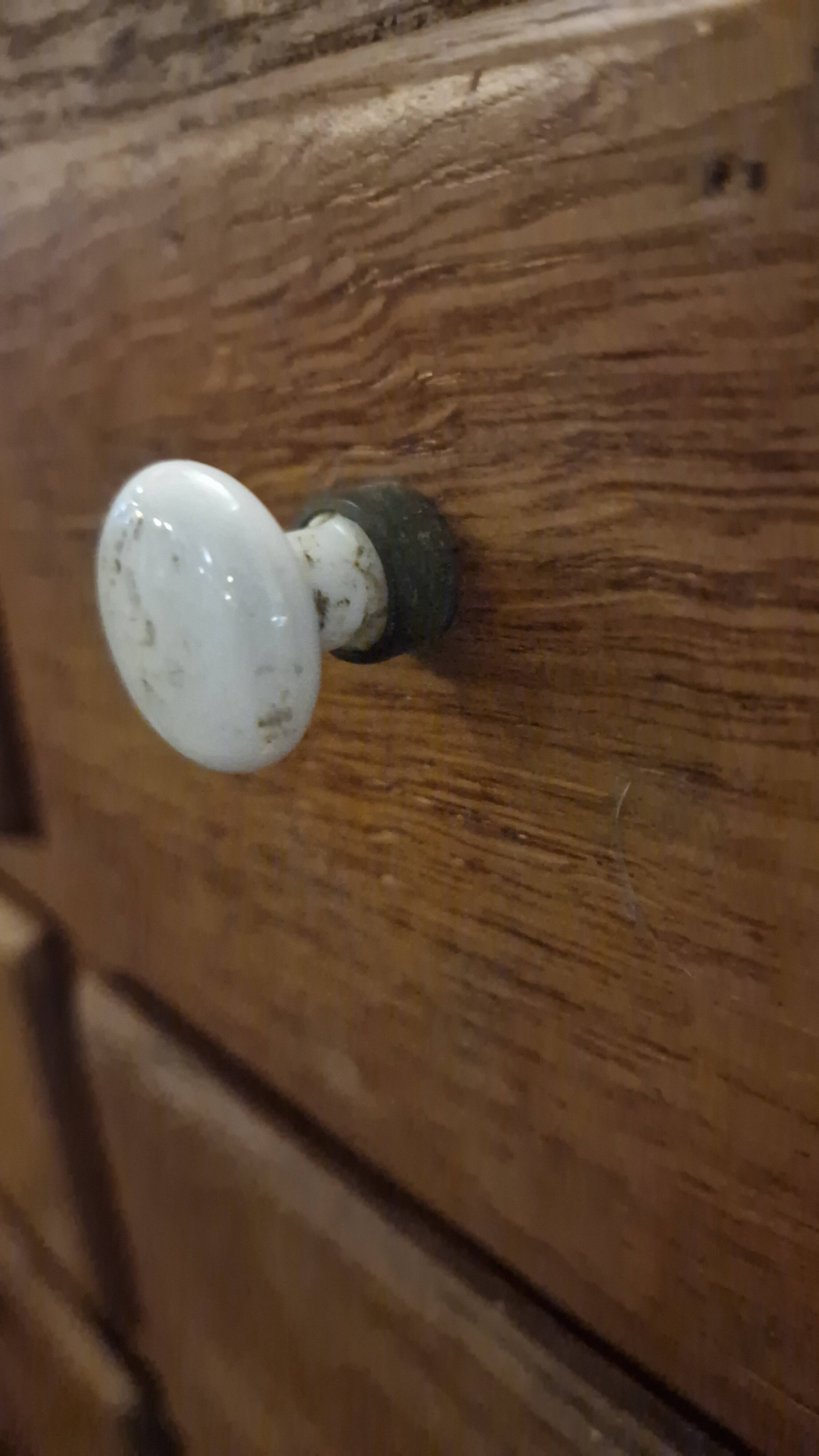 Antique craft cabinet with solid oak drawers and porcelain handles