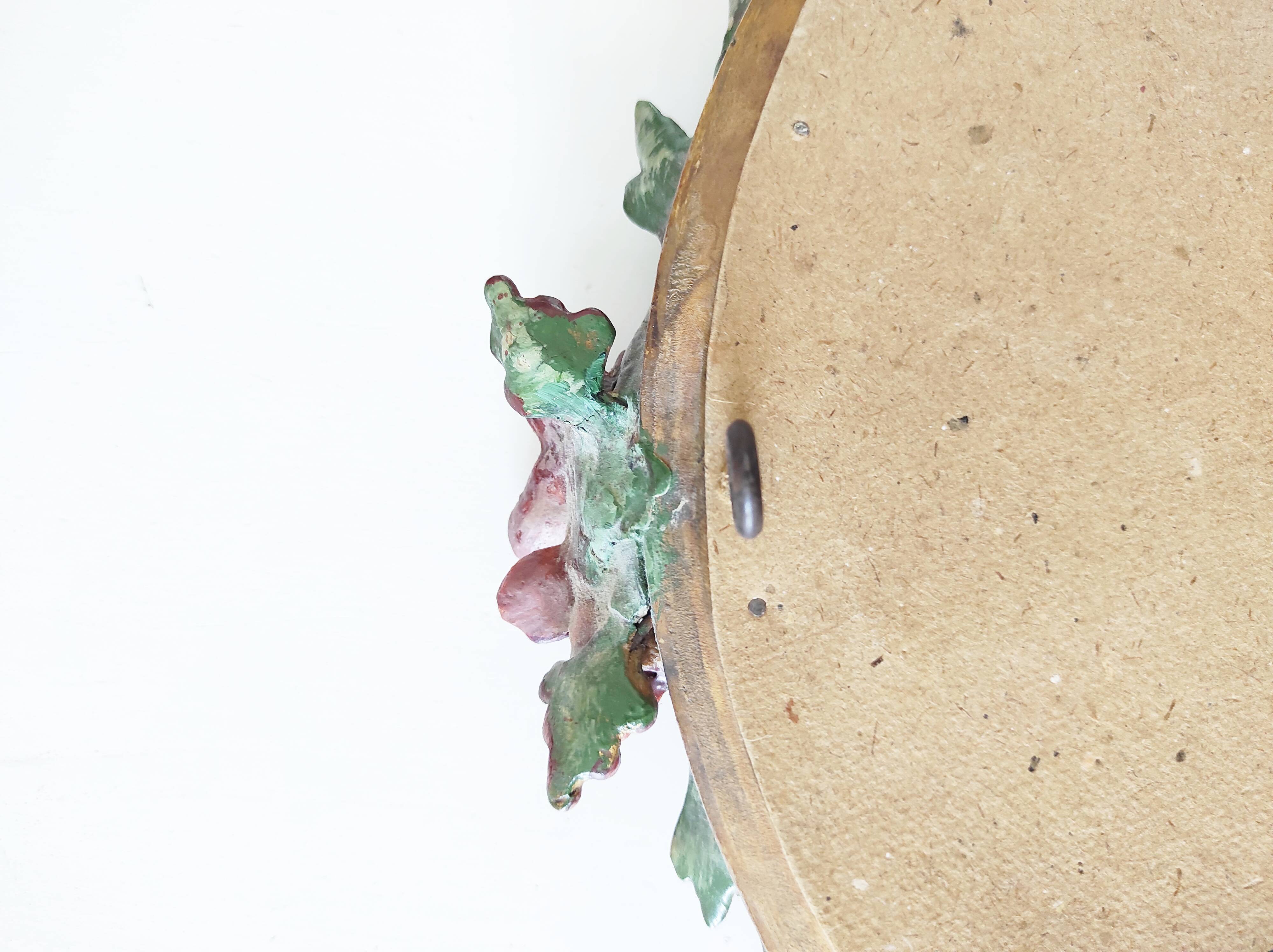 Miroir en bois doré avec fleurs
