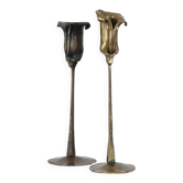 Pair of vintage brass candle holders with tulip decoration.
