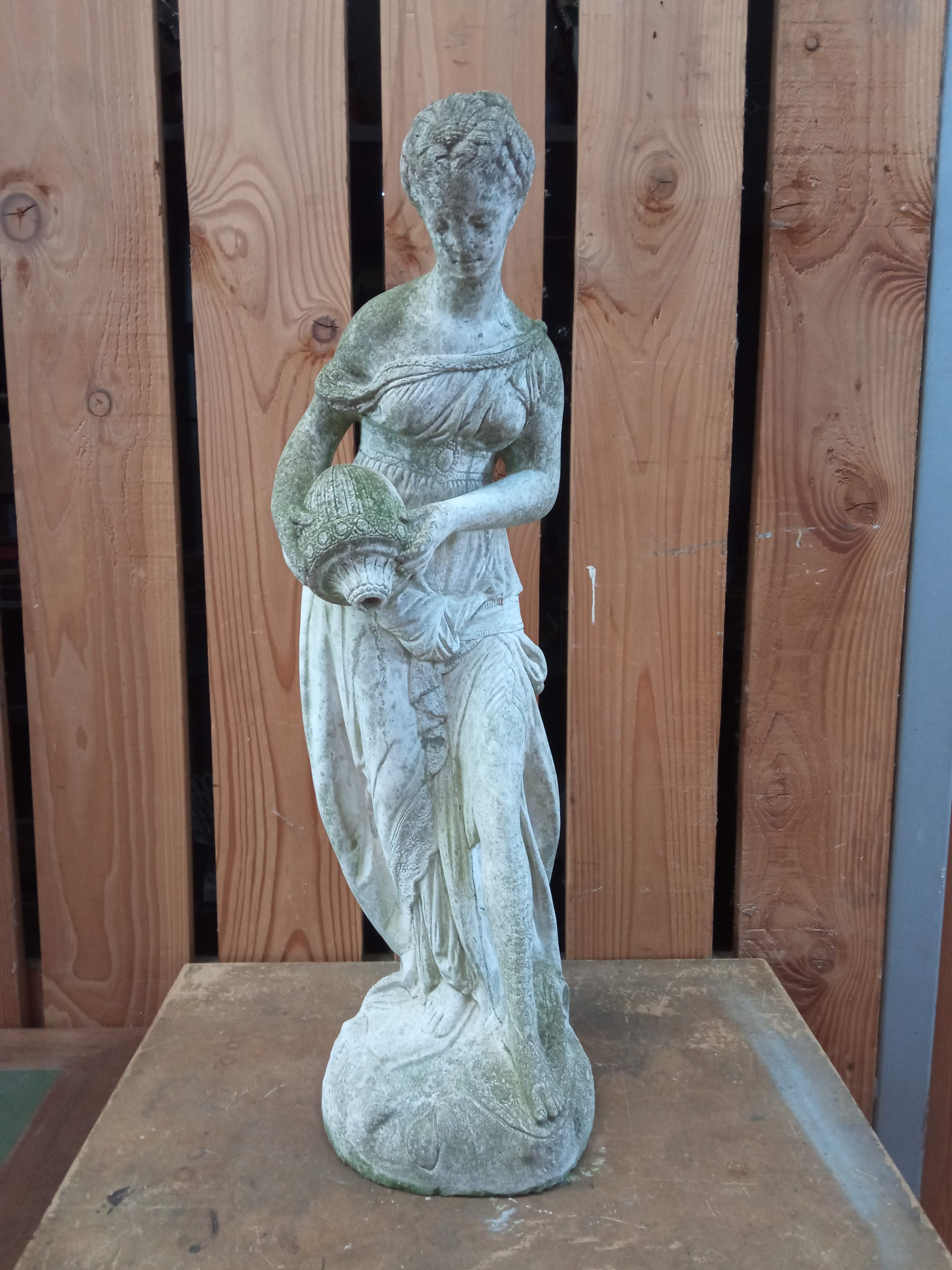 Reconstructed stone garden statue