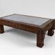 Solid oak coffee table carved with fauns and gray marble top, France, circa 1940
