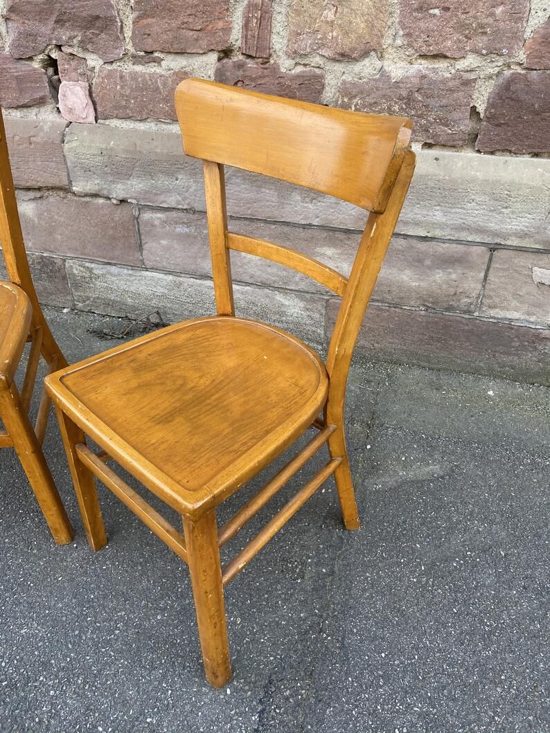 Pair of curved wooden bistro chairs