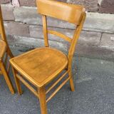 Pair of curved wooden bistro chairs