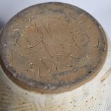 Stoneware vase signed by Sylvie Dufour, incised decoration and relief medallions, 28 cm.