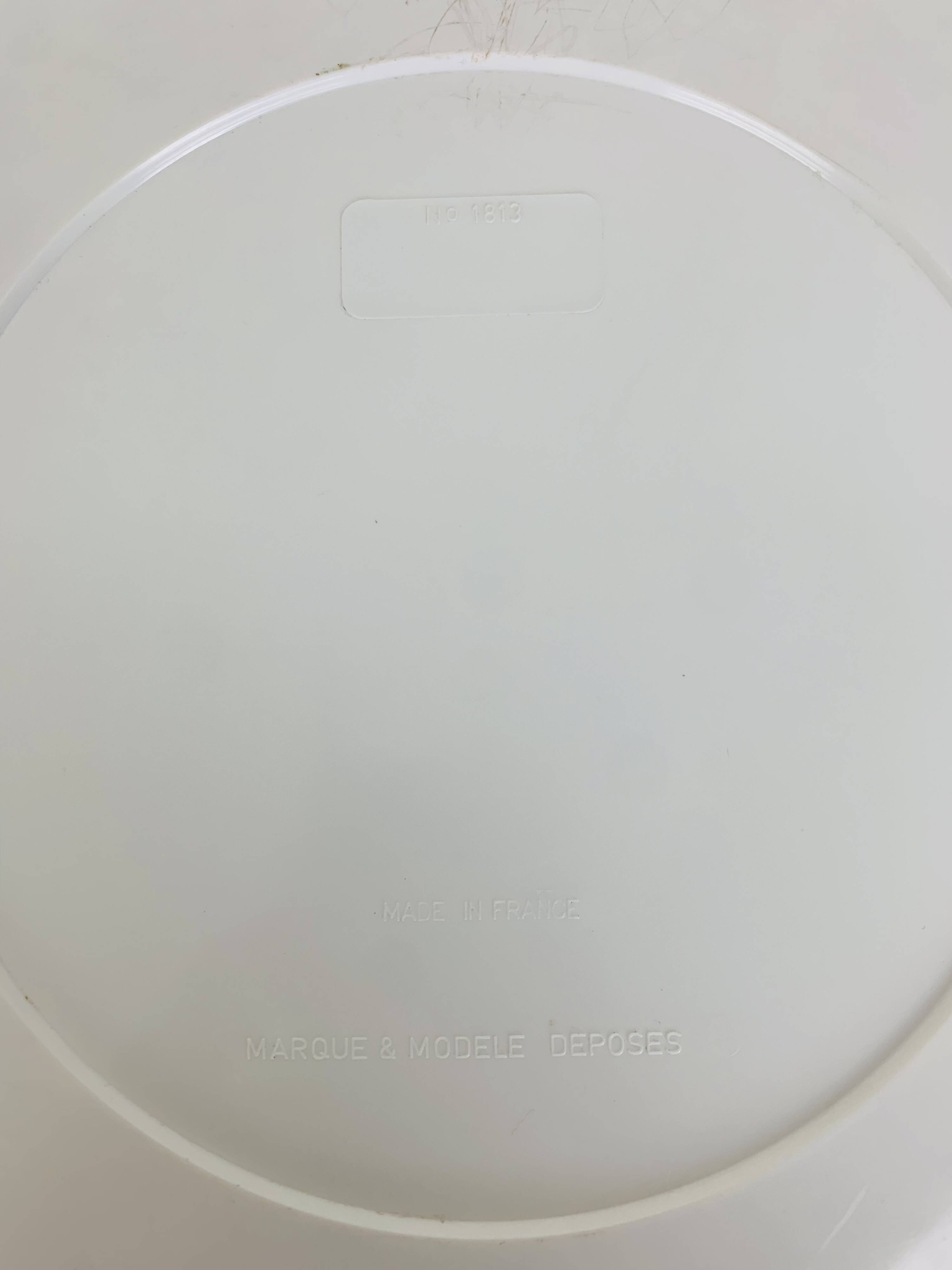 Space age mirror with white frame from the 1970s.