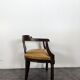 Empire style armchair in mahogany veneer