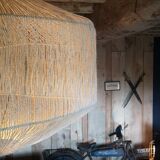 Free-form luminaire in natural sisal