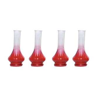 4 red flasks