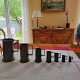 7 old pewter measures