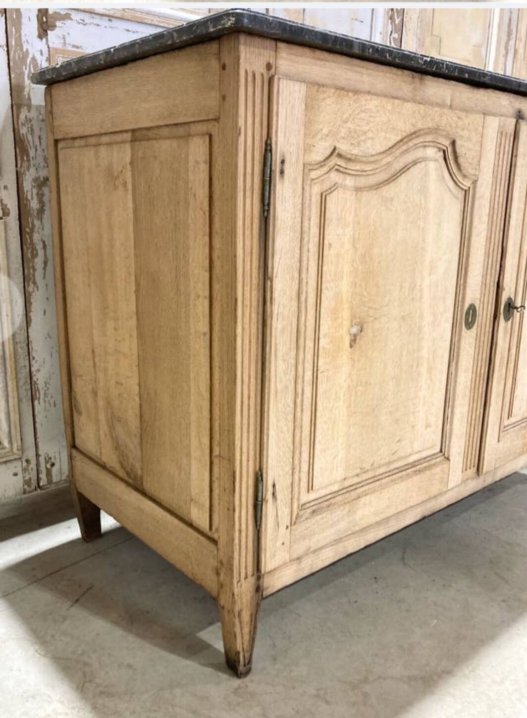 Oak buffet with a marble top from the 18th century.