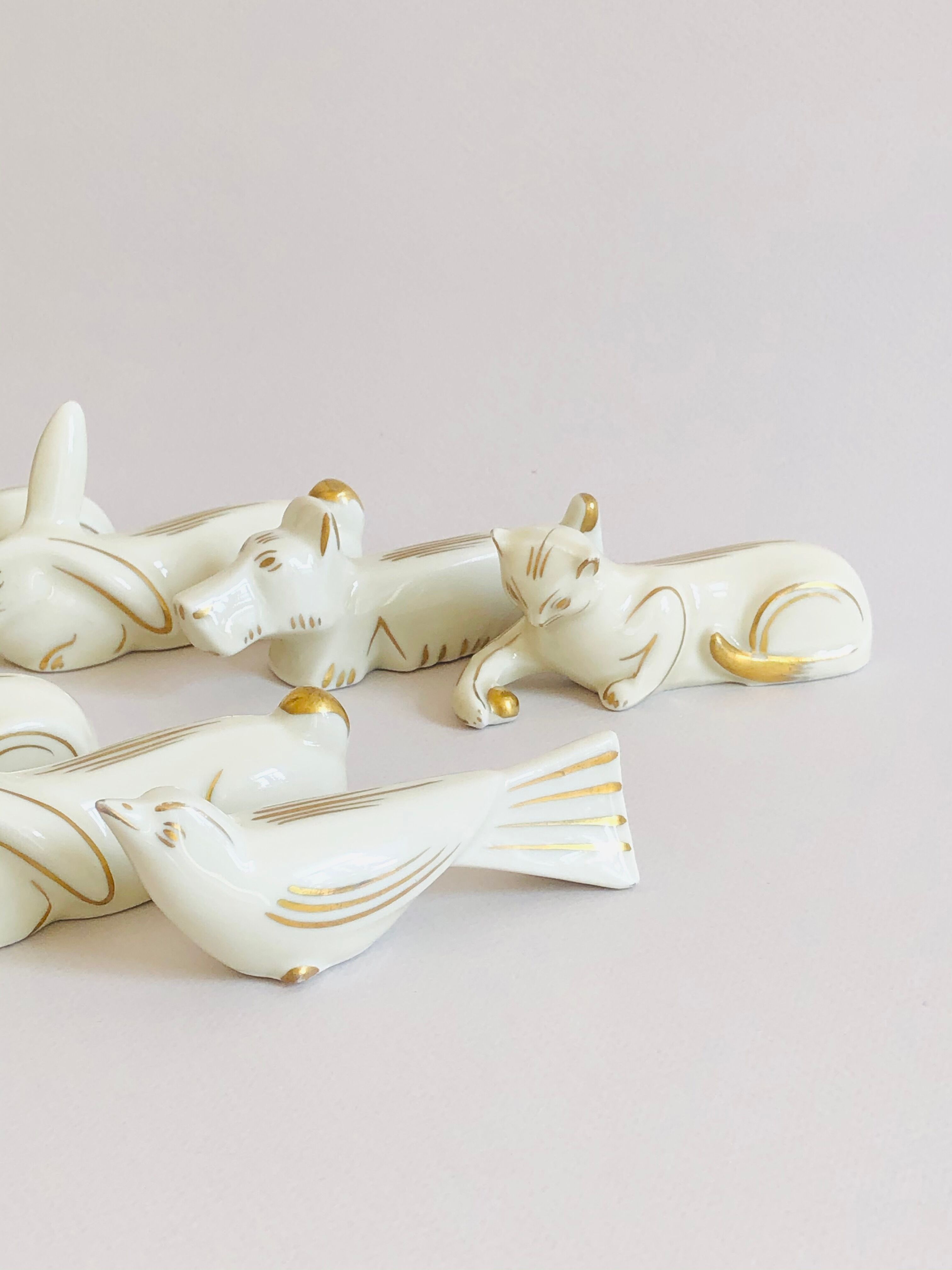 Set of 8 art deco ceramic animal knife holders