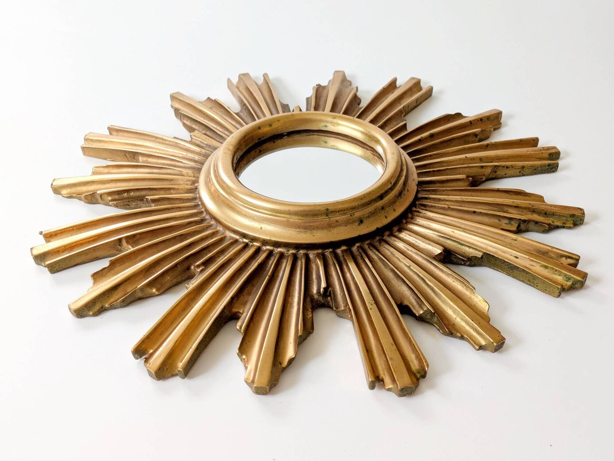 Vintage sunburst mirror in wood and gold resin, 1960s–70s