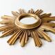 Vintage sunburst mirror in wood and gold resin, 1960s–70s