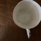 Porcelain cup fine decoration flowers and golden edge