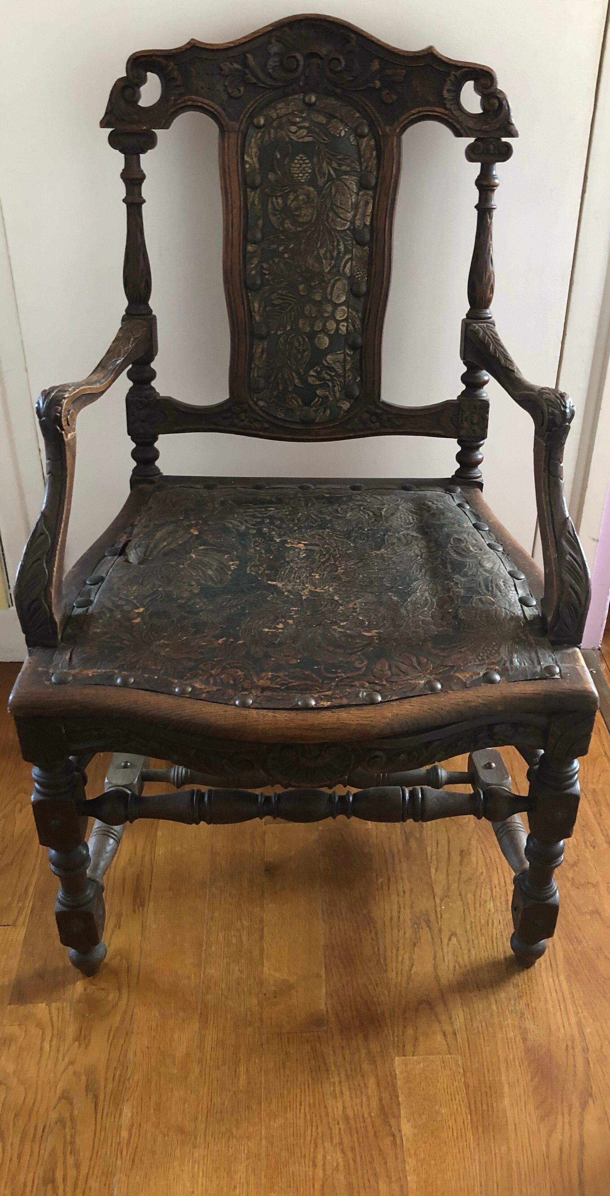 Old carved wooden armchair