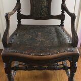 Old carved wooden armchair