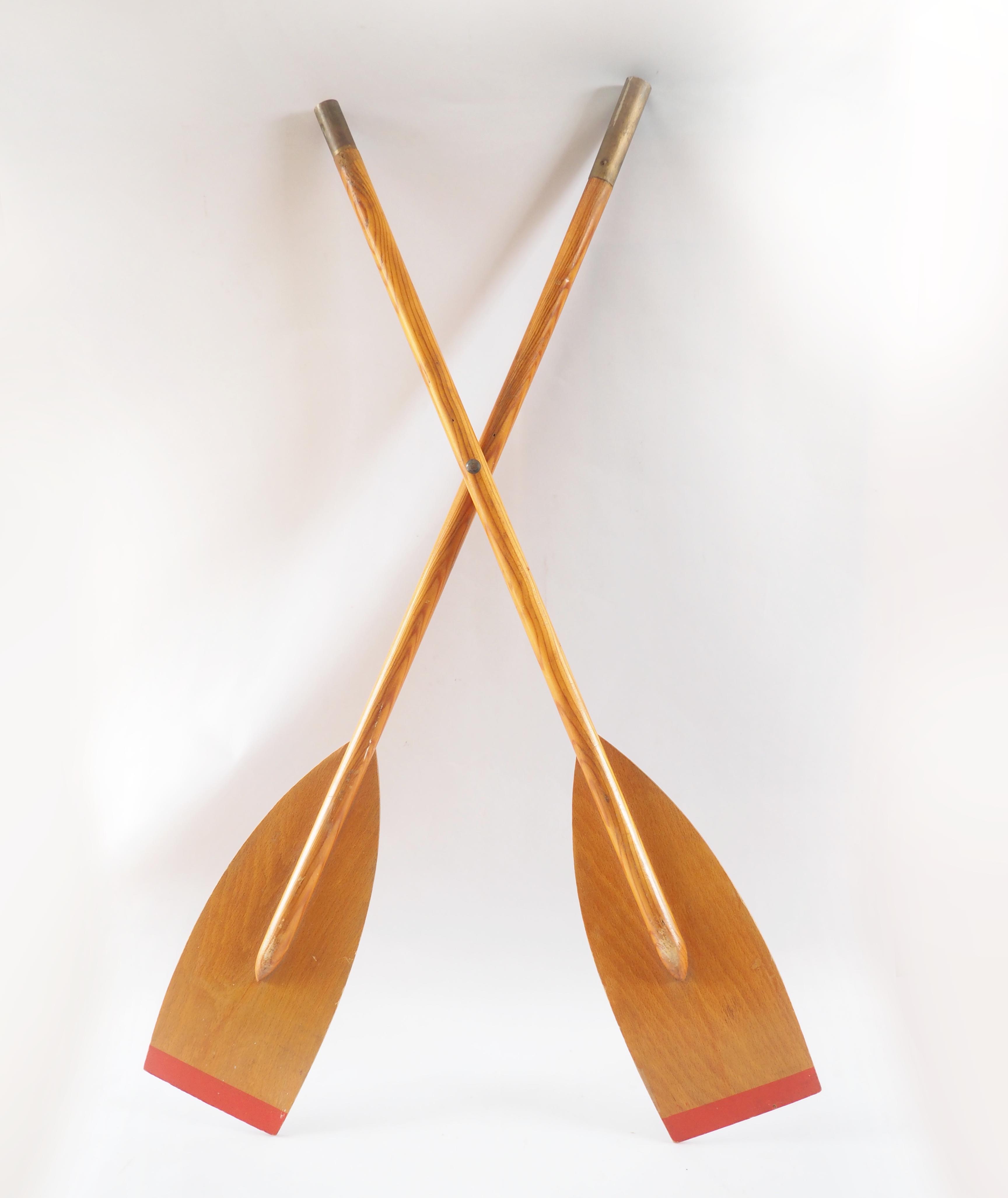 Pair of old wooden oars