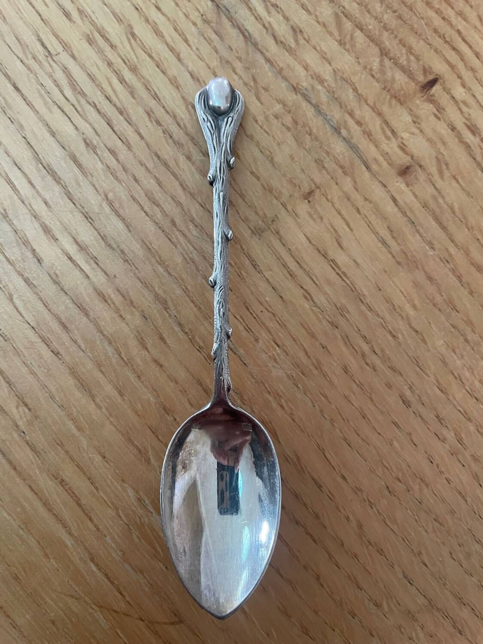 12 cuillères à moka en métal argenté