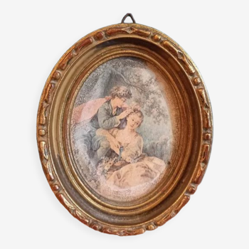 Oval frame wood gilded stucco patinated couple