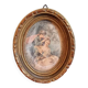 Oval frame wood gilded stucco patinated couple