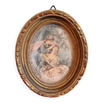 Oval frame wood gilded stucco patinated couple