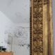 Golden stucco and wood Empire mirror