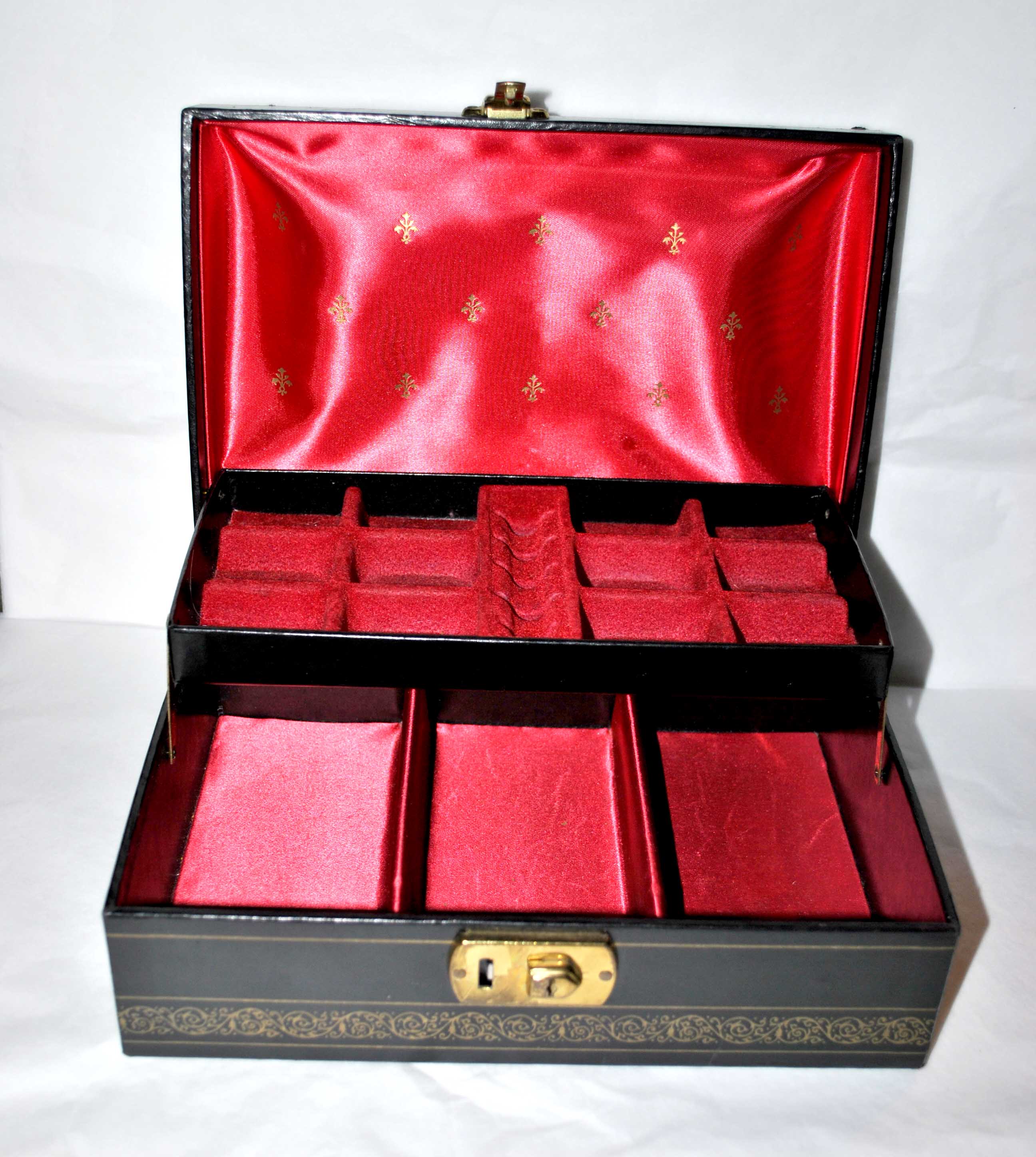 Vintage jewelry box in black leather and red interior