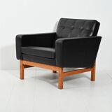 Swedish AB Futura teak and faux leather armchair