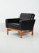 Swedish AB Futura teak and faux leather armchair
