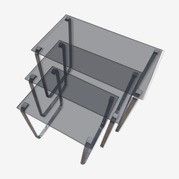 Stainless steel trundle table and smoked glass
