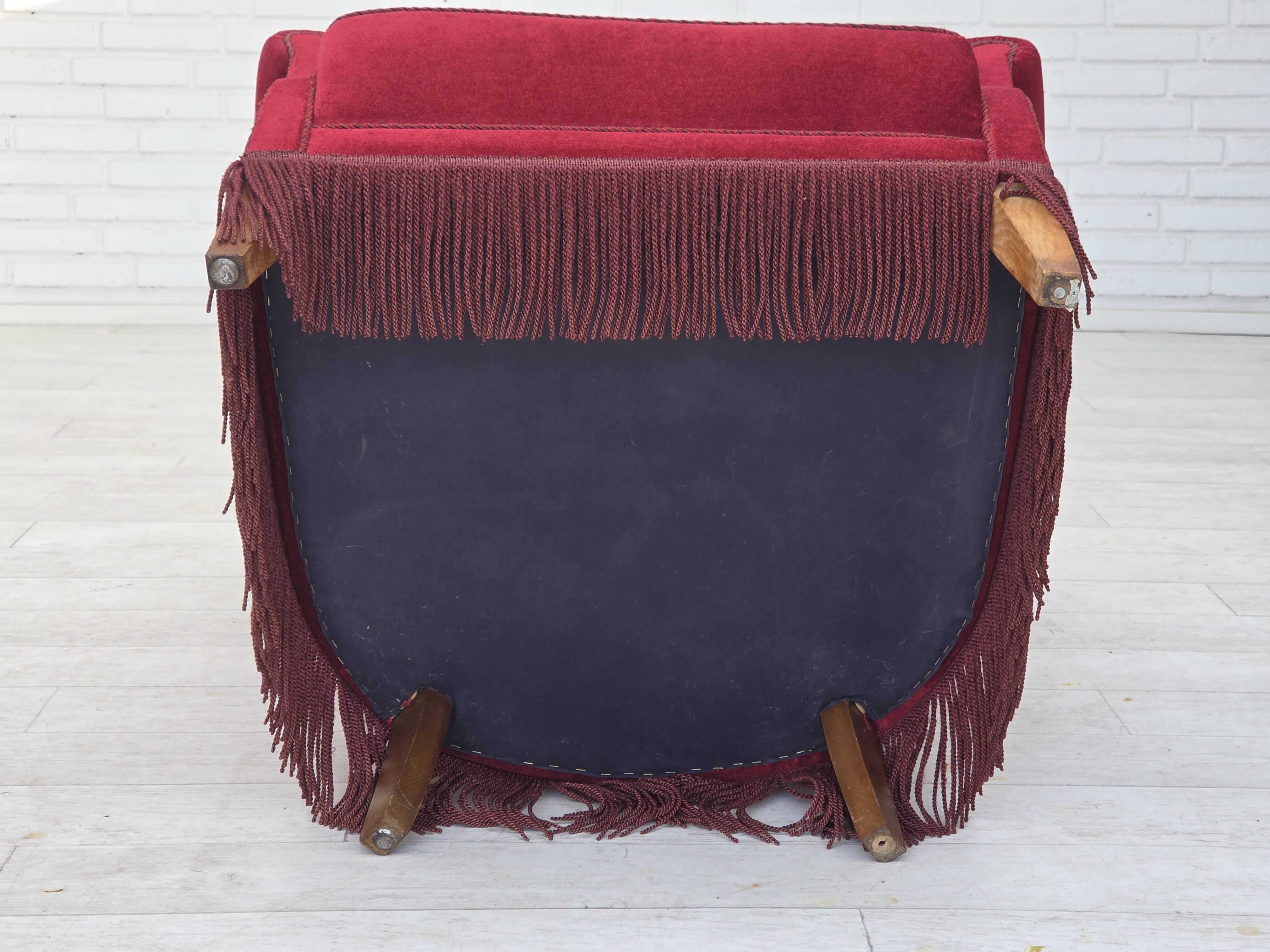 1970s, Danish armchair, cherry-red furniture velour, oak wood legs.