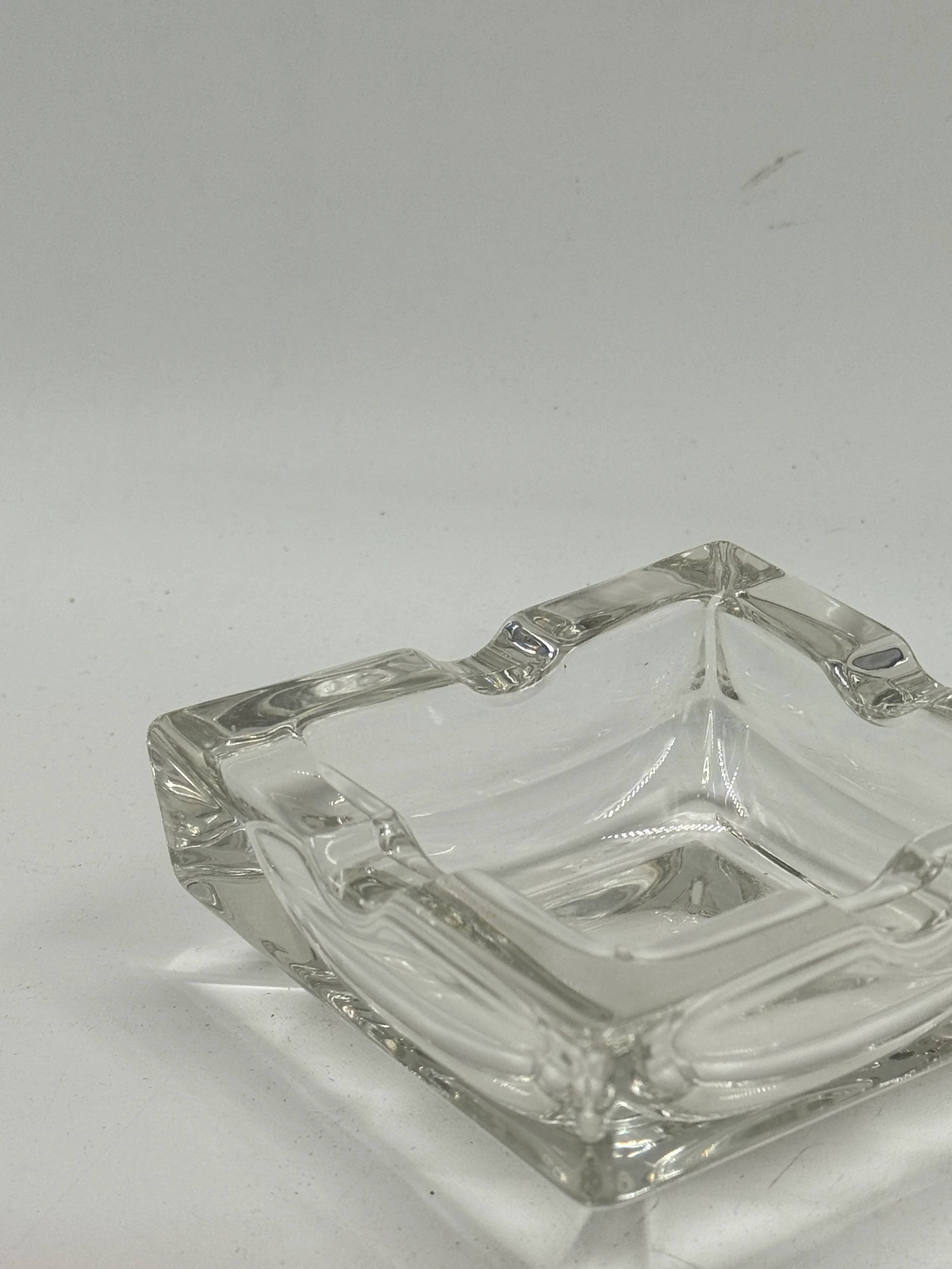 Vintage rectangular glass ashtray, design with two cigarette rests.