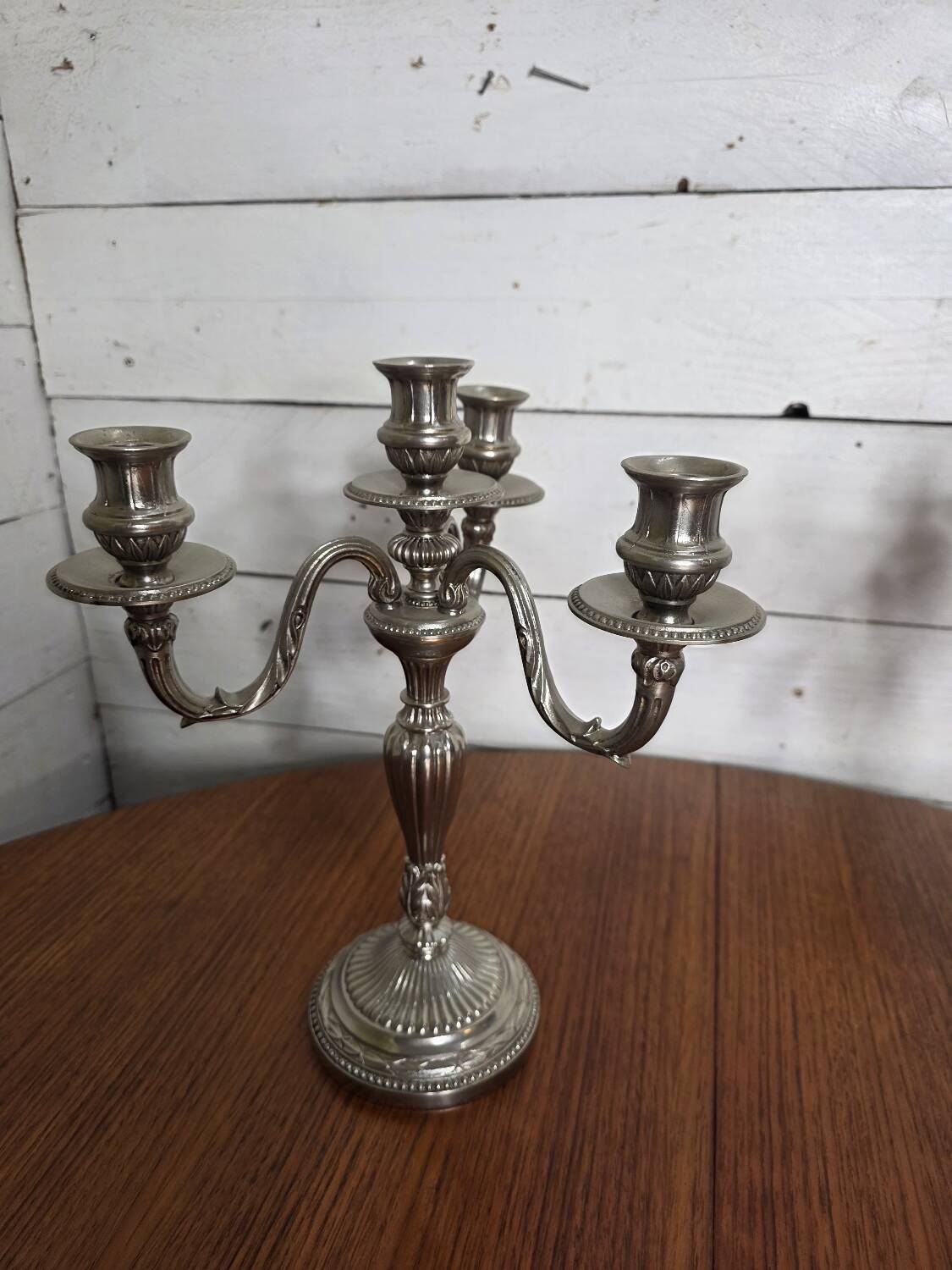 Pair of Louis XVI style candlesticks in silver-plated bronze