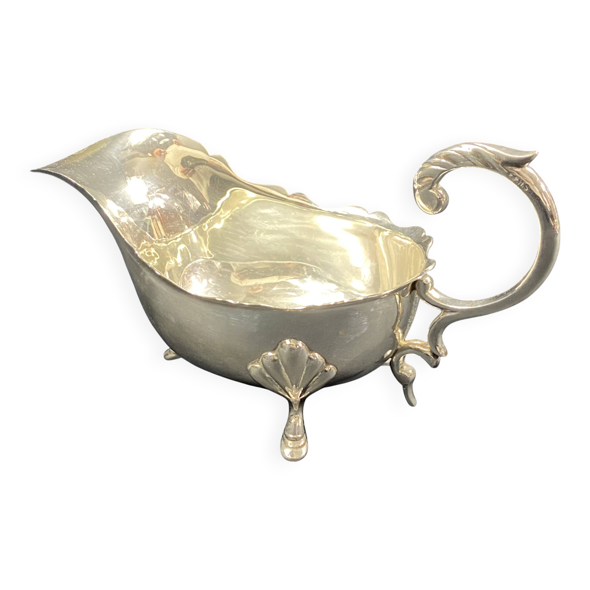 English George III style silver plated tripod sauce boat