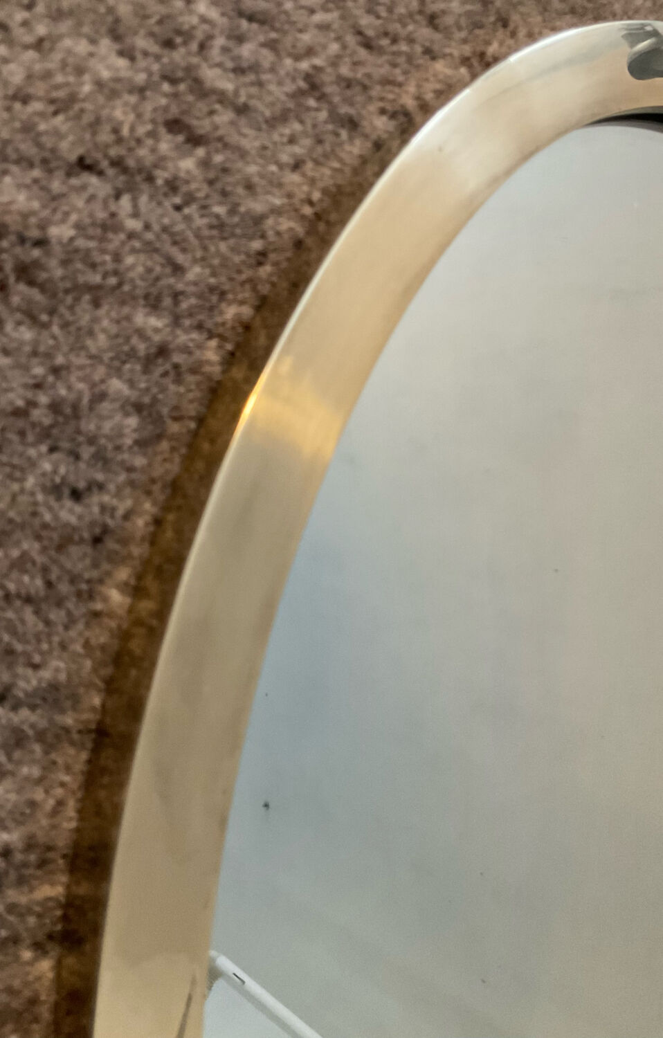 Vintage oval mirror in solid brass