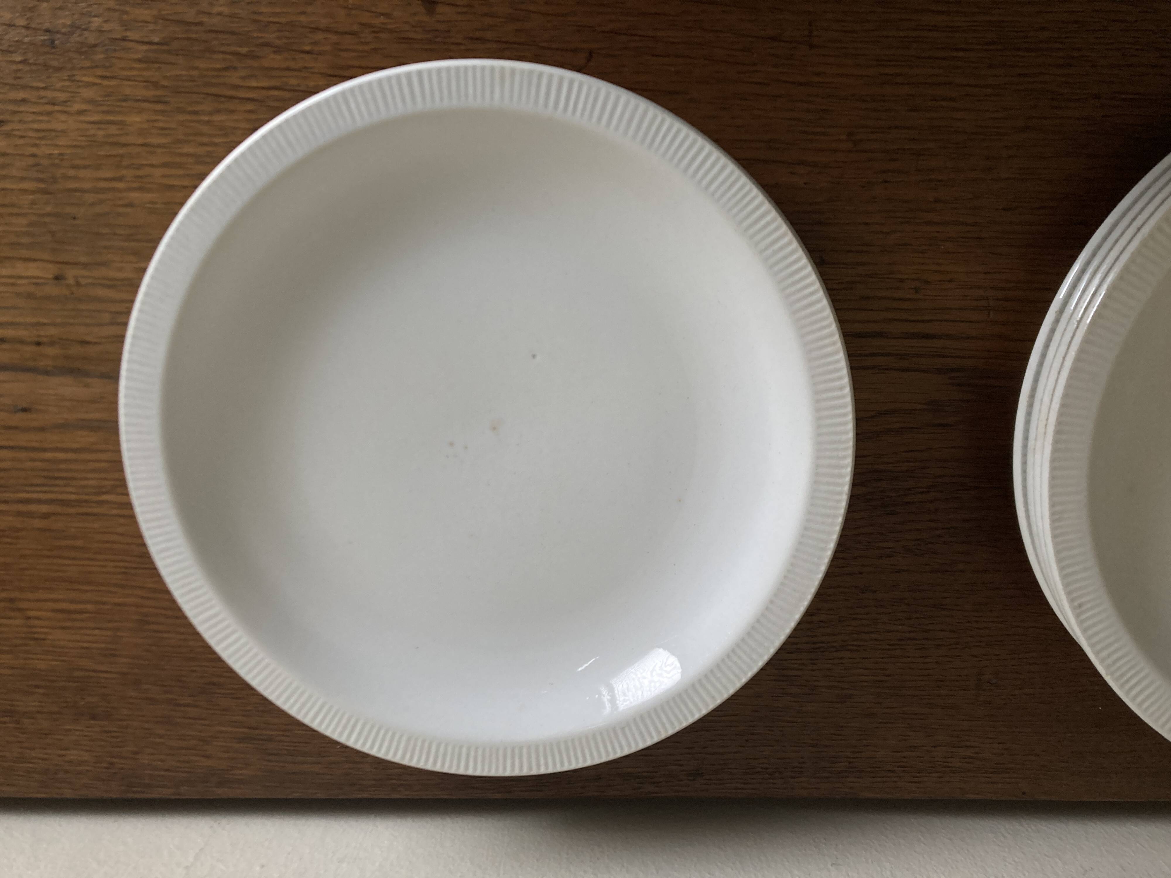 Set of 7 modernist flat plates Lunéville 1930 white earthenware