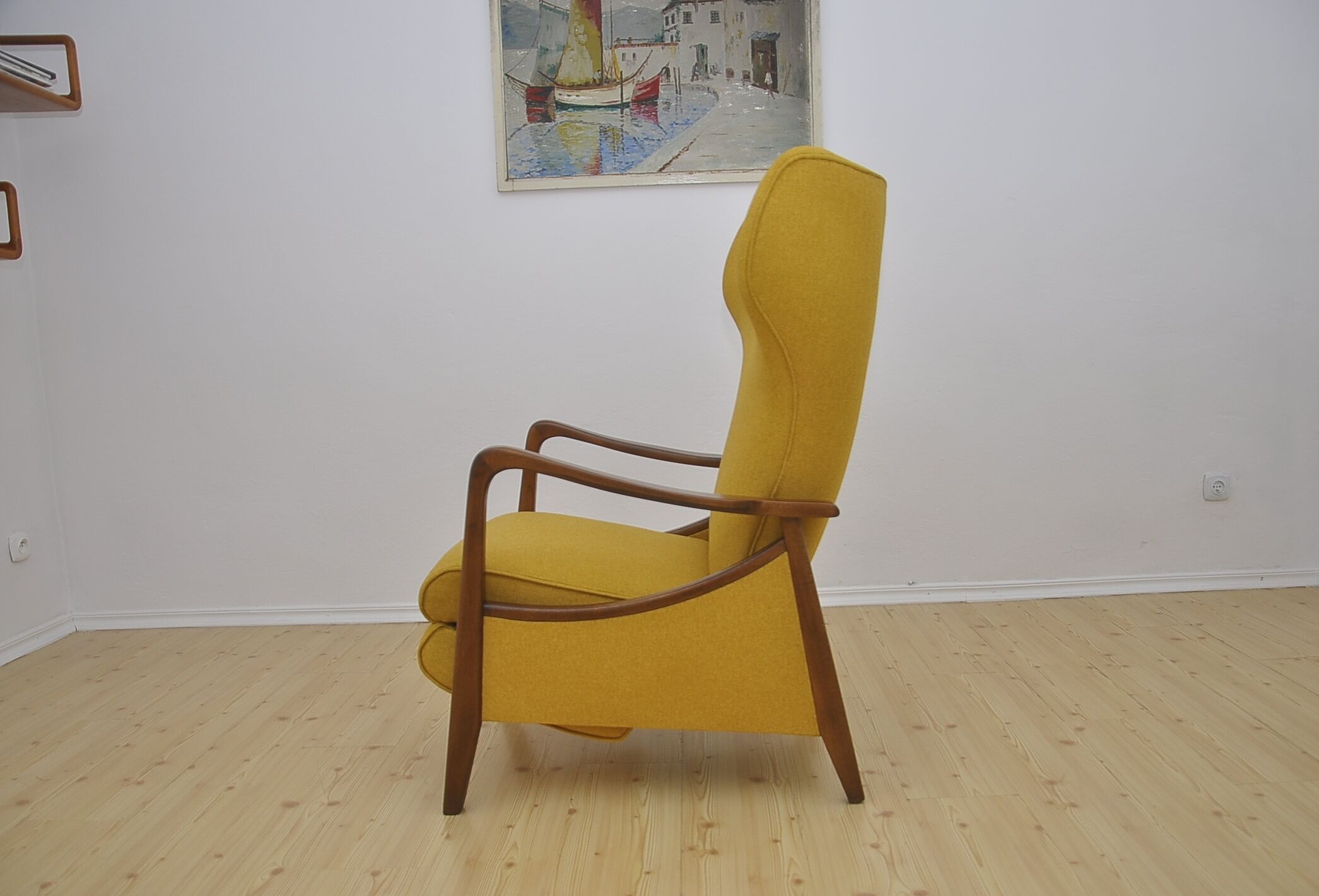 Mid-century Wingback armchair with folding footrest, 1960s