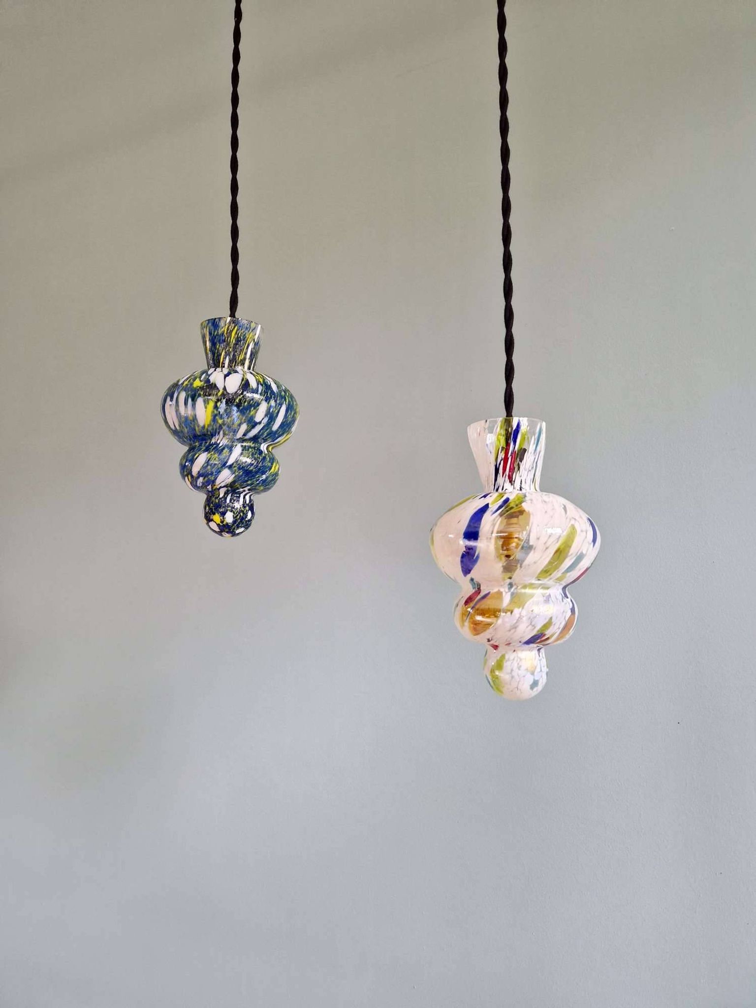 A pair of multicoloured blown glass suspensions, Murano, 1950-60.