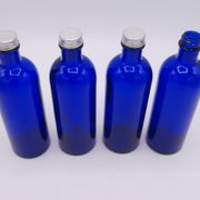 Ensemble de 4 petites bouteilles