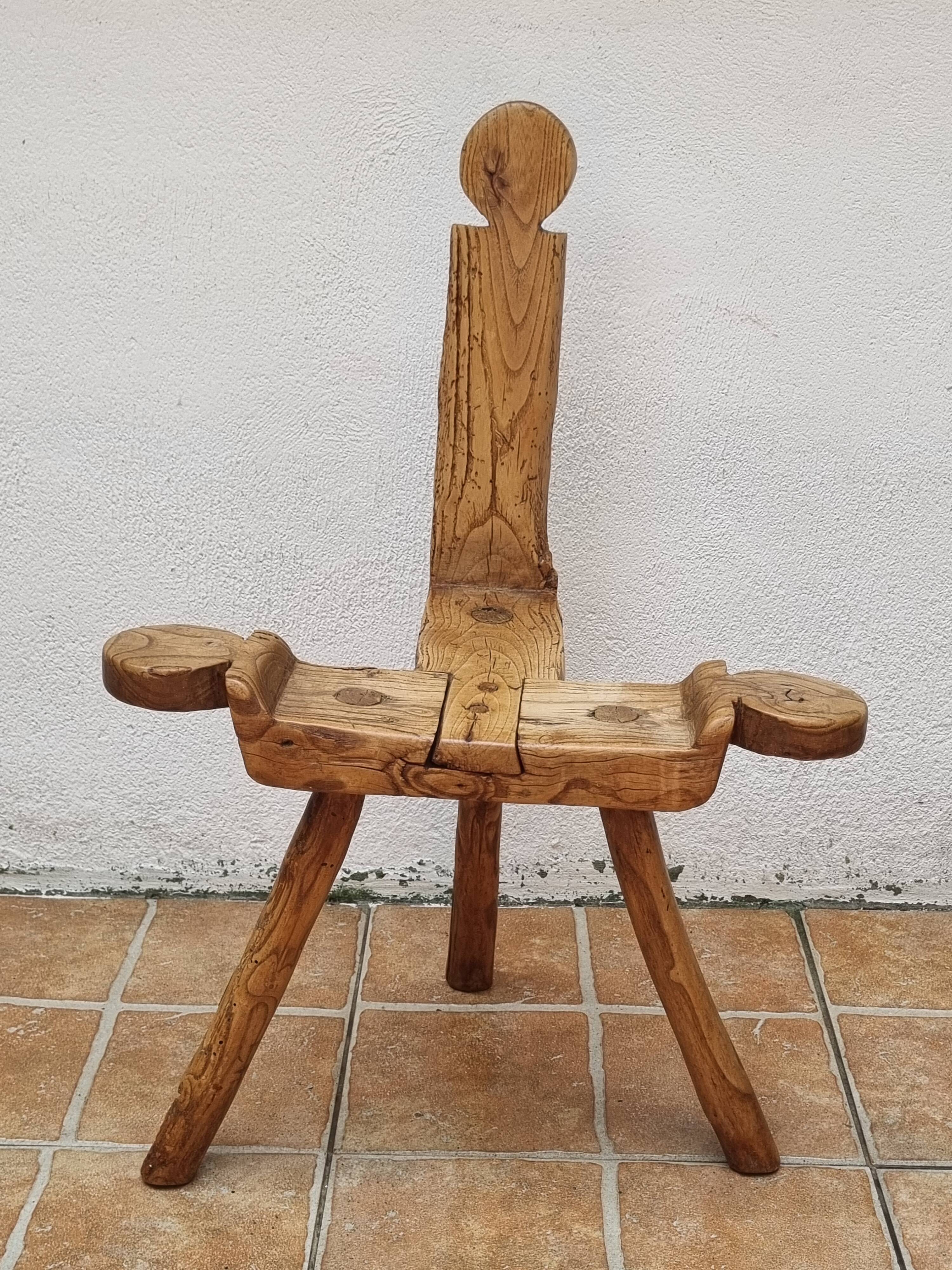 Brutalist chair in solid wood, European handcrafted work from the early 20th century.