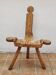Brutalist chair in solid wood, European handcrafted work from the early 20th century.