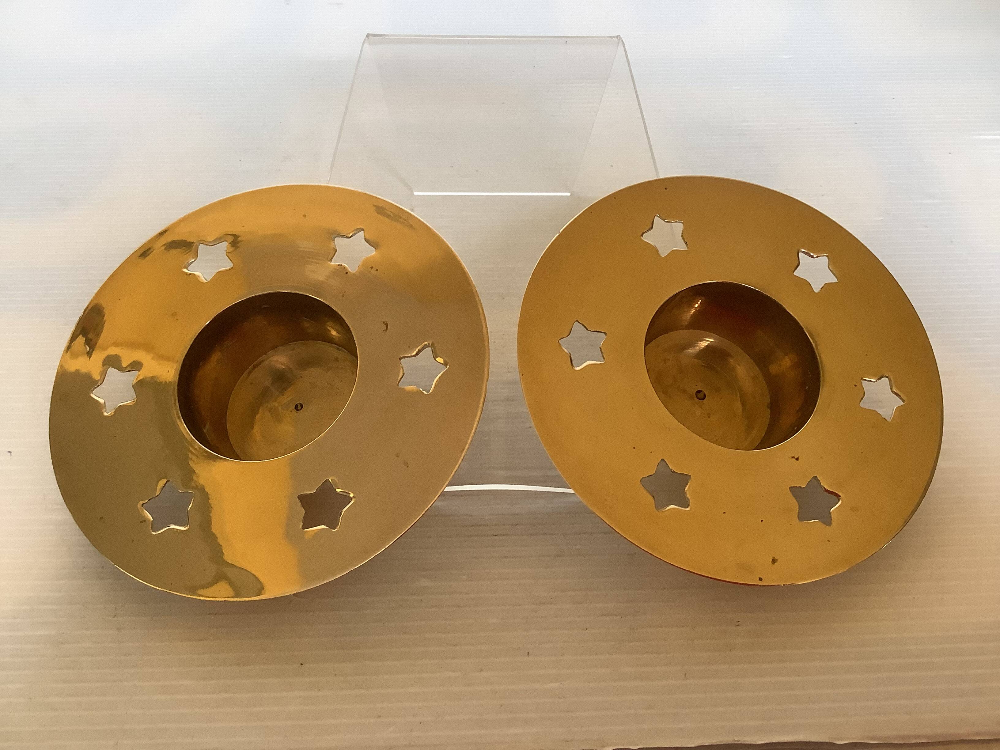 Pair of star candle holders in brass