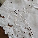 Old embroidered tablecloth open
