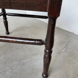 Straw chair by the fireside 1900