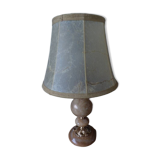 Lamp with base in polished beige-brown stones and its leather lampshade